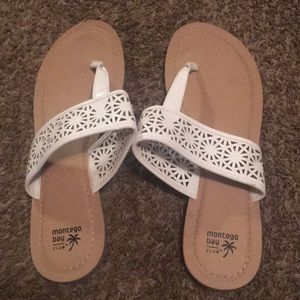 Super cute white strapped sandal/flip flop.